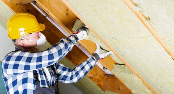 Green Homes - Stock image - loft insulation in progress 570 x 310