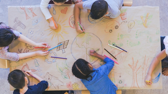 children making climate change posters - solar panels competition