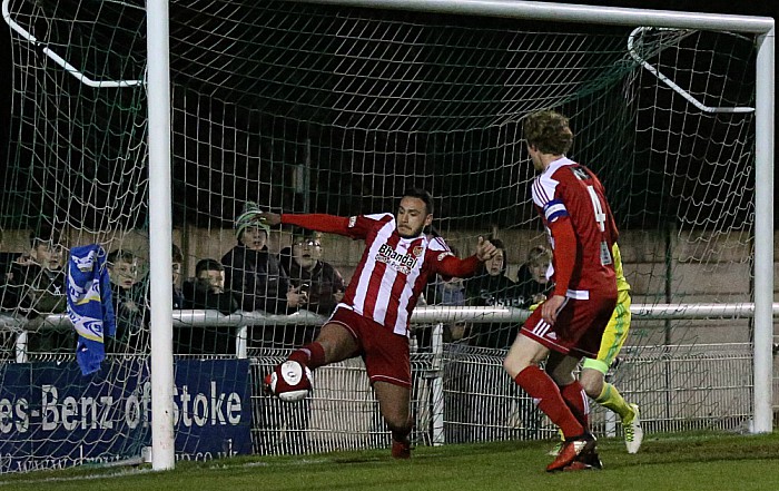 Stourbridge clear the ball off their line in the 11th minute