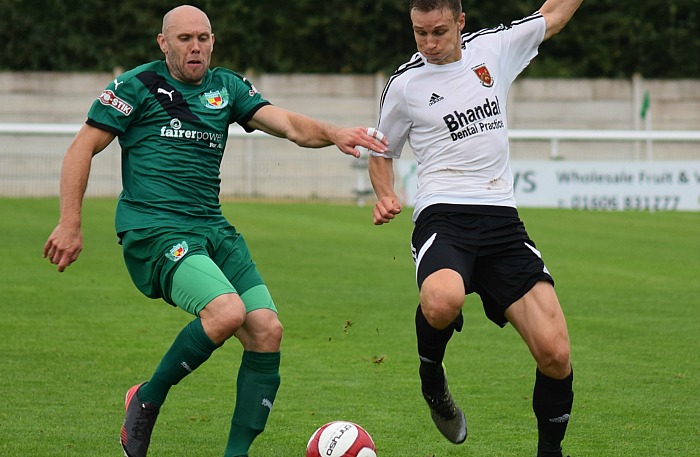 Sub Dave Walker goes for the ball against Stourbridge