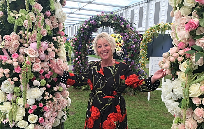 TV gardening Presenter Carol Klein with floral arch (1)