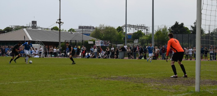 Team Carl attack the goal - Everall Derby charity game