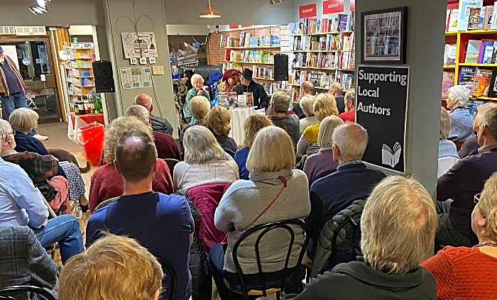 The audience listens to author Norah Carlin (1)