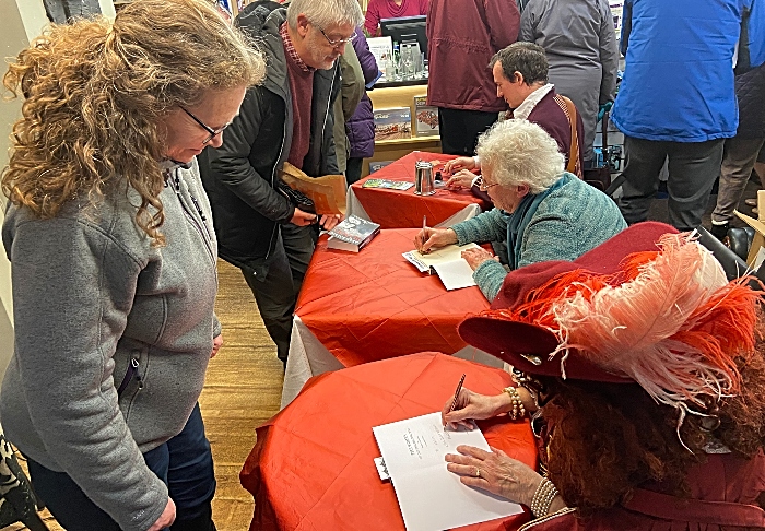 The authors sign their books (1)