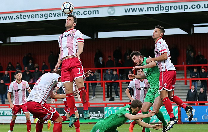 Cup - Theo Stair and Harry Clayton are both flattened in the penalty area