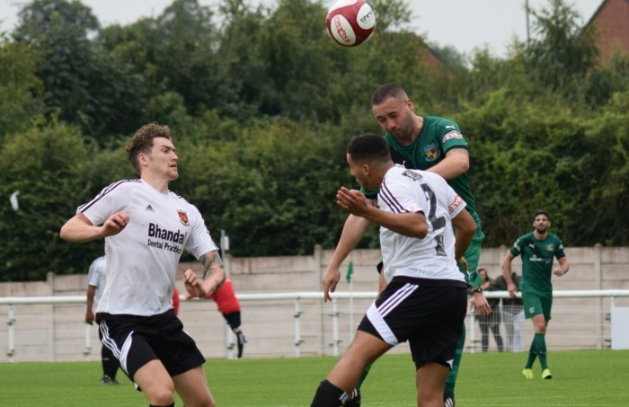 Theo Stair heads the ball forwards against Stourbridge