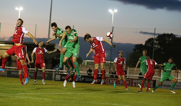 Theo Stair heads the ball towards the Buxton goal