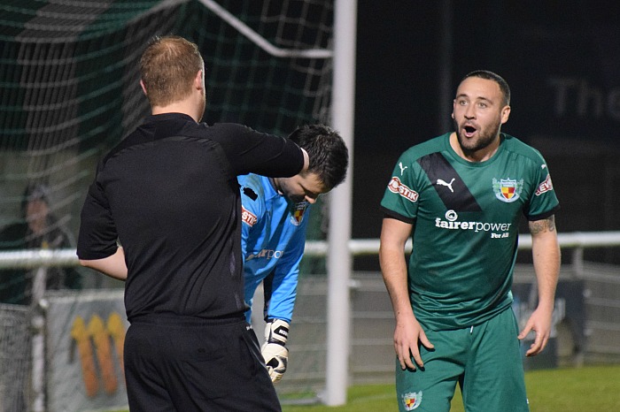 Theo Stair receives his second yellow card for an alleged dive inside the penalty area