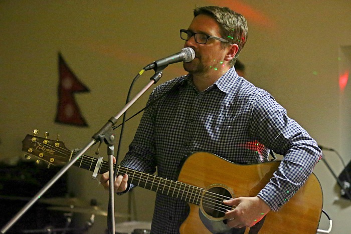 Tim Lee performs at the fund-raising music concert