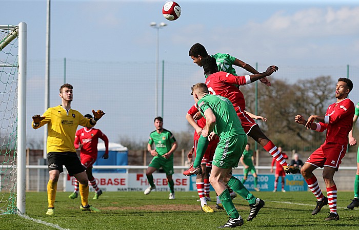 Troy Bourne brave header is just wide of target