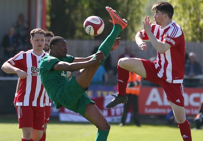 Vinny Mukendi fights for the ball