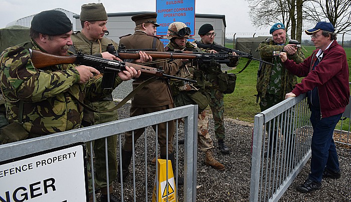 Visitor Andrew Lyon complies with Forces and shows his entry ticket