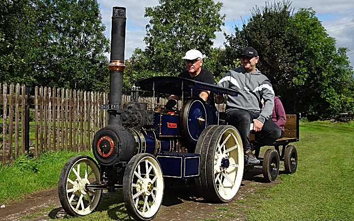 Visitors enjoy a ride on miniature 4-inch scale steam traction engine Maud (2)