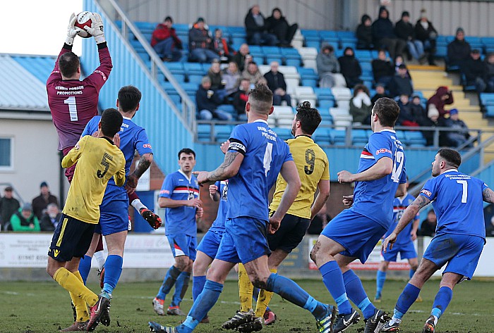 Whitby goalkeeper Jack Norton collects the ball