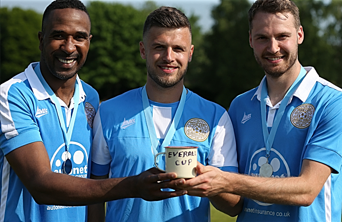 charity game - Winning team captain Carl Everall -centre- with teammates Ricardo Fuller and Nick Powell and the Everall Cup