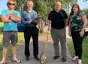 Councillors help residents measure out Barony Park for boundary work