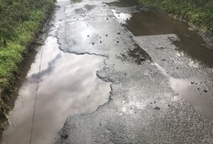 Alpraham villagers battle to fix drains on crumbling Cheshire road