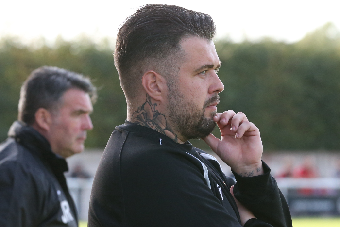 kettering boss Marcus Law and Nantwich boss (background) Dave Cooke