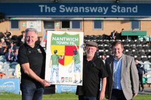 Nantwich artist Tony donates artwork to Nantwich Town FC