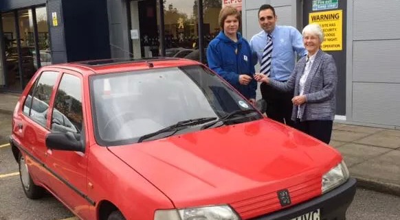 mrs forster with Alex Walker at Crewe Peugeot