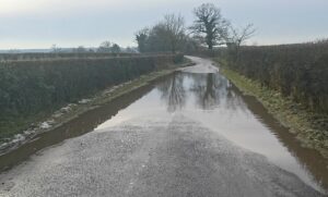 Nantwich lane flooded for months without repairs, say residents