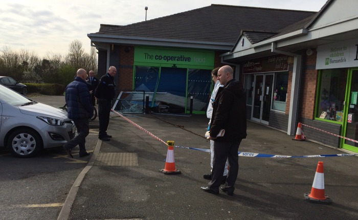 police forensics at co-operative store cashpoint raid