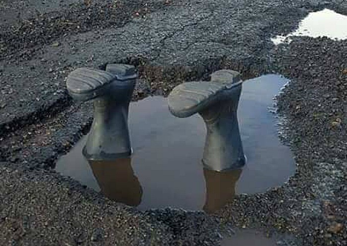 very deep pothole - pic by Nige Smith