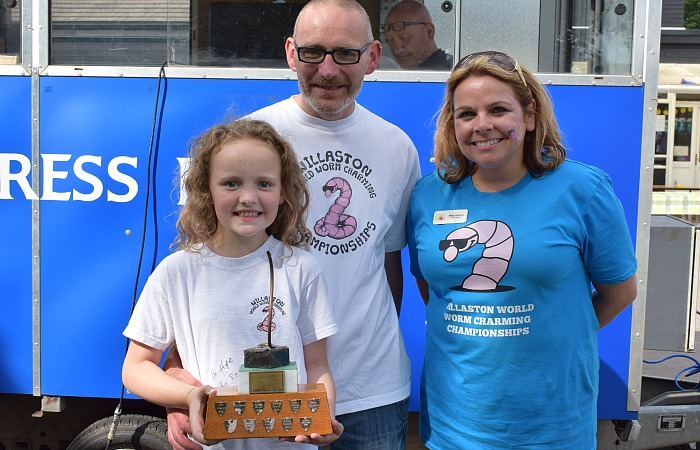 worm charming - Championship trophy for Most Worms - Hope Smith with Dad Matt Smith and Willaston Primary Academy Headteacher Clare Grehan